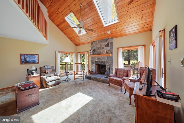 101 Harvey Ln, Chadds Ford, PA 19317 - carpeted living area featuring a skylight, high vaulted ceiling, a fireplace, and wooden ceiling