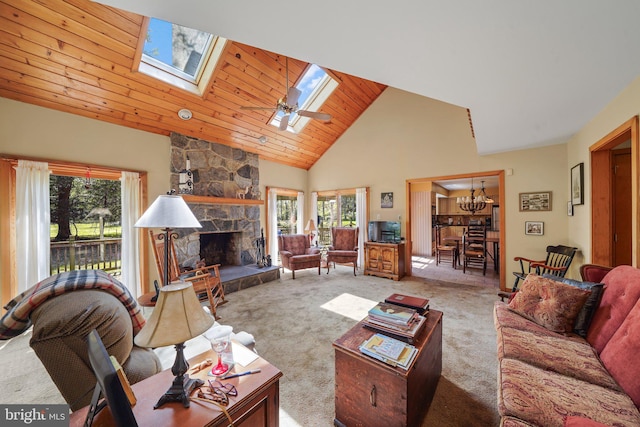 101 Harvey Ln, Chadds Ford, PA 19317 - living room featuring carpet flooring, high vaulted ceiling, an inviting chandelier, and a healthy amount of sunlight