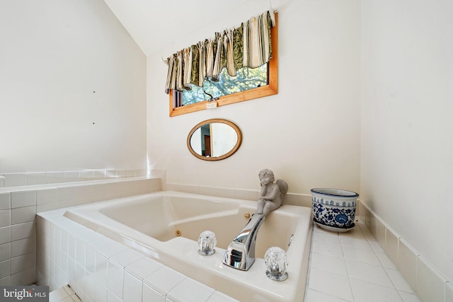 101 Harvey Ln, Chadds Ford, PA 19317 - bathroom featuring a tub with jets, tile patterned flooring, and vaulted ceiling