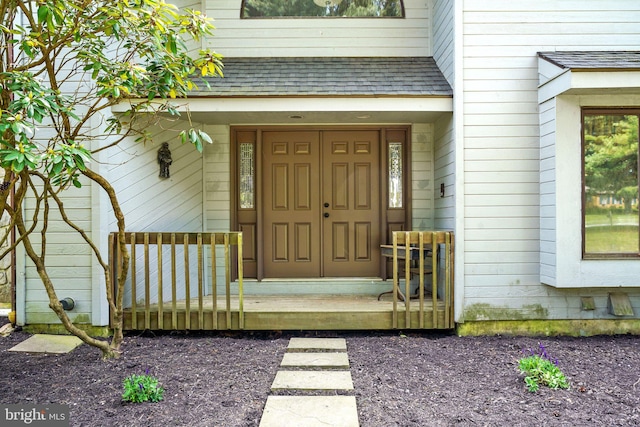 101 Harvey Ln, Chadds Ford, PA 19317 - doorway to property featuring a shingled roof