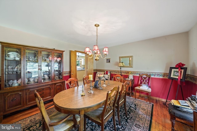 101 Harvey Ln, Chadds Ford, PA 19317 - dining area featuring wainscoting, wood finished floors, and a notable chandelier