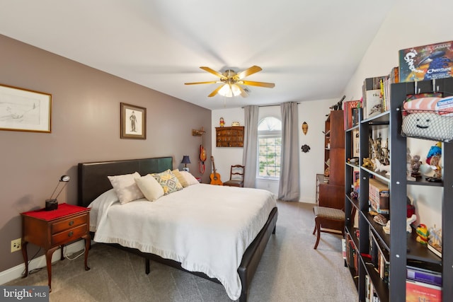 bedroom featuring carpet floors, baseboards, and ceiling fan