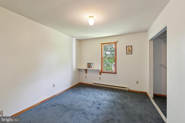 unfurnished bedroom with baseboards, a baseboard radiator, and carpet flooring