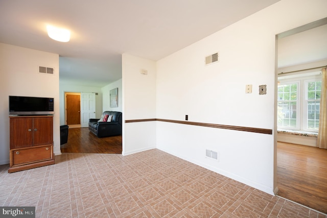 11 Whitekirk Dr, Wilmington, DE 19808 - unfurnished room featuring visible vents, baseboards, and wood finished floors