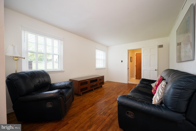 11 Whitekirk Dr, Wilmington, DE 19808 - living area featuring dark wood finished floors and visible vents