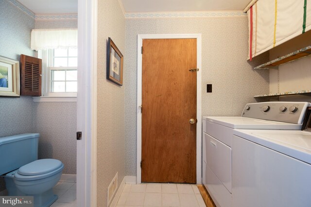11 Whitekirk Dr, Wilmington, DE 19808 - laundry room featuring visible vents, washer and clothes dryer, wallpapered walls, and laundry area