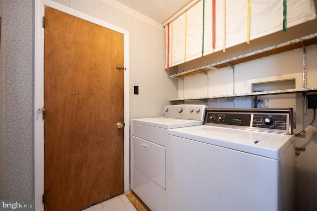 11 Whitekirk Dr, Wilmington, DE 19808 - washroom with cabinet space, washing machine and dryer, and light tile patterned flooring