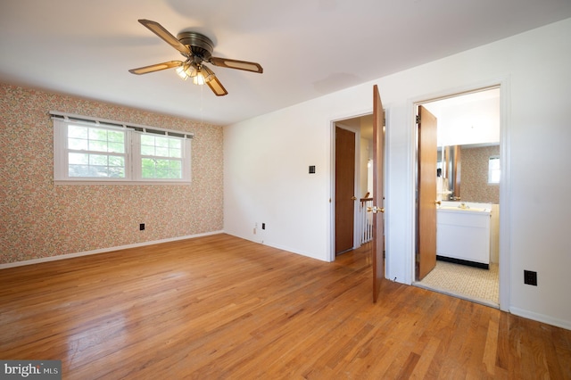 11 Whitekirk Dr, Wilmington, DE 19808 - empty room with a ceiling fan, plenty of natural light, and light wood-type flooring