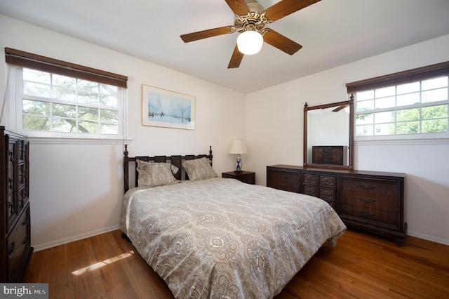 11 Whitekirk Dr, Wilmington, DE 19808 - bedroom with baseboards, a ceiling fan, wood finished floors, and multiple windows