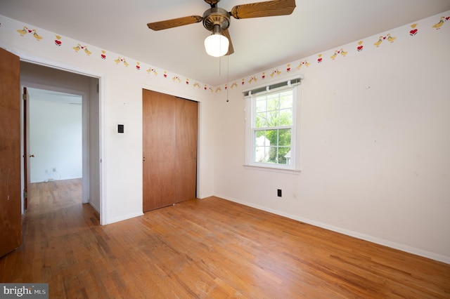 11 Whitekirk Dr, Wilmington, DE 19808 - unfurnished bedroom featuring baseboards, ceiling fan, a closet, and wood finished floors