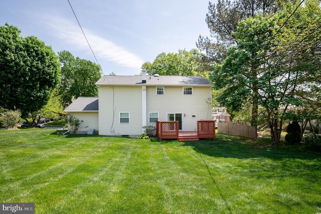 11 Whitekirk Dr, Wilmington, DE 19808 - rear view of property featuring a wooden deck, a yard, and fence
