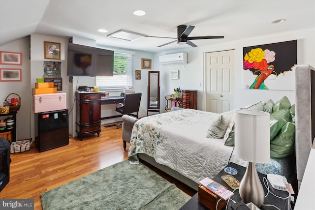 4311 Chatham Rd, Baltimore, MD 21207 - bedroom with a wall mounted air conditioner, light wood-style flooring, a closet, recessed lighting, and ceiling fan