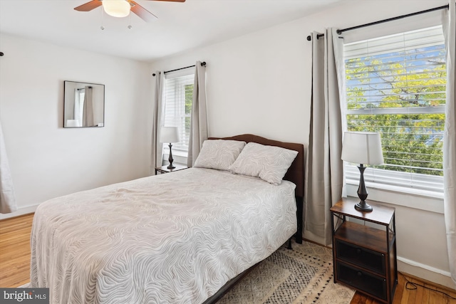 4311 Chatham Rd, Baltimore, MD 21207 - bedroom with light wood-style floors and baseboards