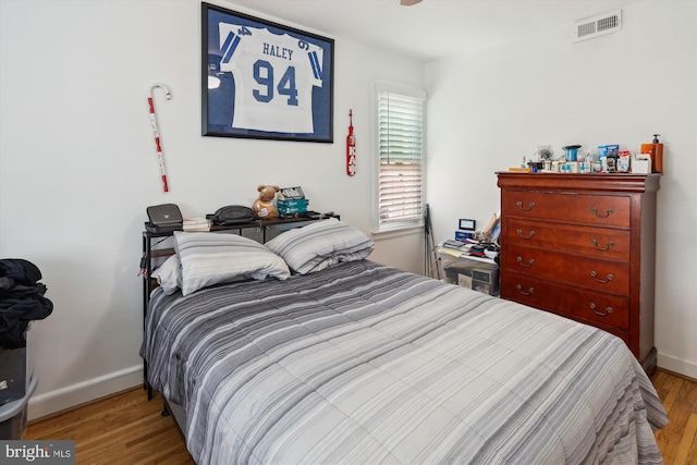 4311 Chatham Rd, Baltimore, MD 21207 - bedroom featuring wood finished floors and baseboards