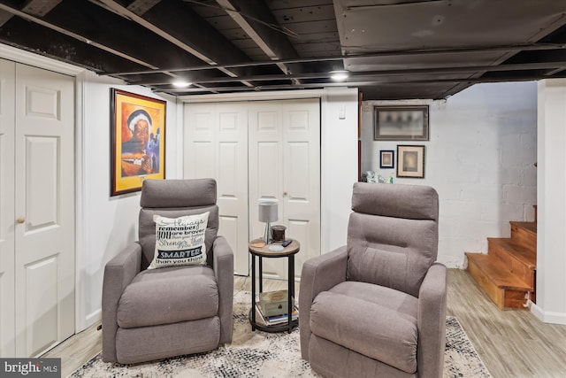 4311 Chatham Rd, Baltimore, MD 21207 - living area with wood finished floors and stairs