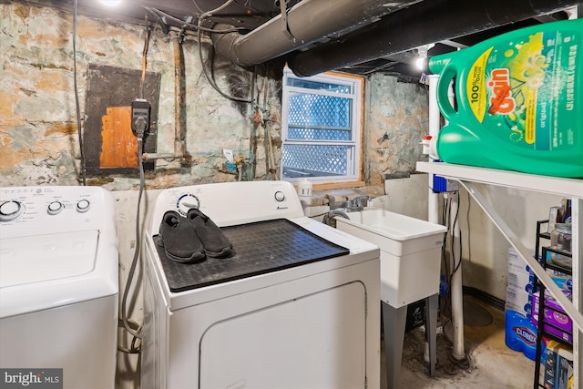 4311 Chatham Rd, Baltimore, MD 21207 - laundry room featuring separate washer and dryer