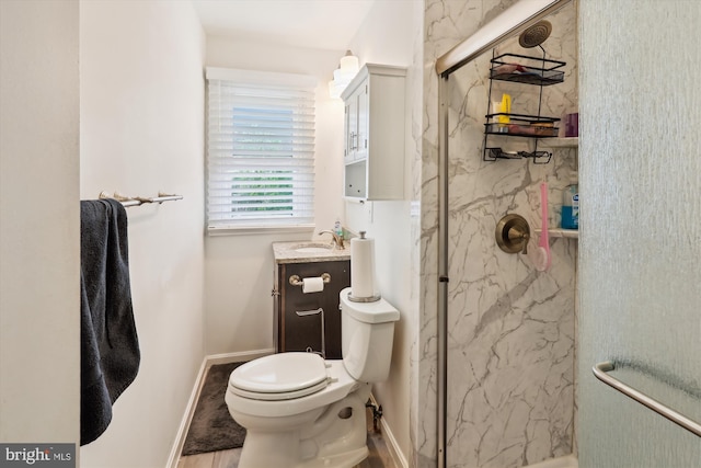 4311 Chatham Rd, Baltimore, MD 21207 - bathroom featuring a marble finish shower, vanity, and toilet