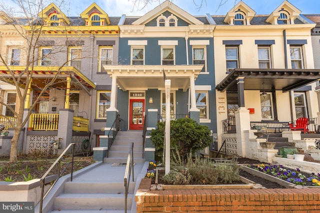 multi unit property featuring a porch