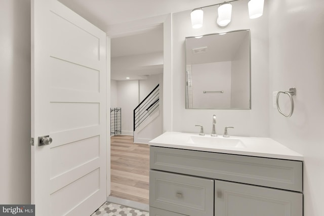 bathroom with vanity and visible vents