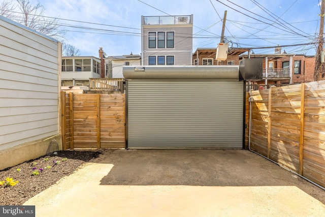 view of gate with fence