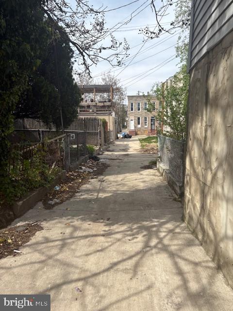 view of road with driveway