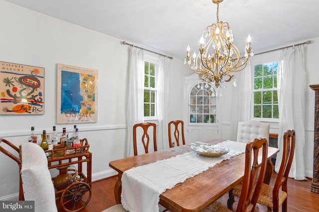 110 Murdock Rd, Baltimore, MD 21212 - dining room featuring a chandelier, plenty of natural light, and wood finished floors