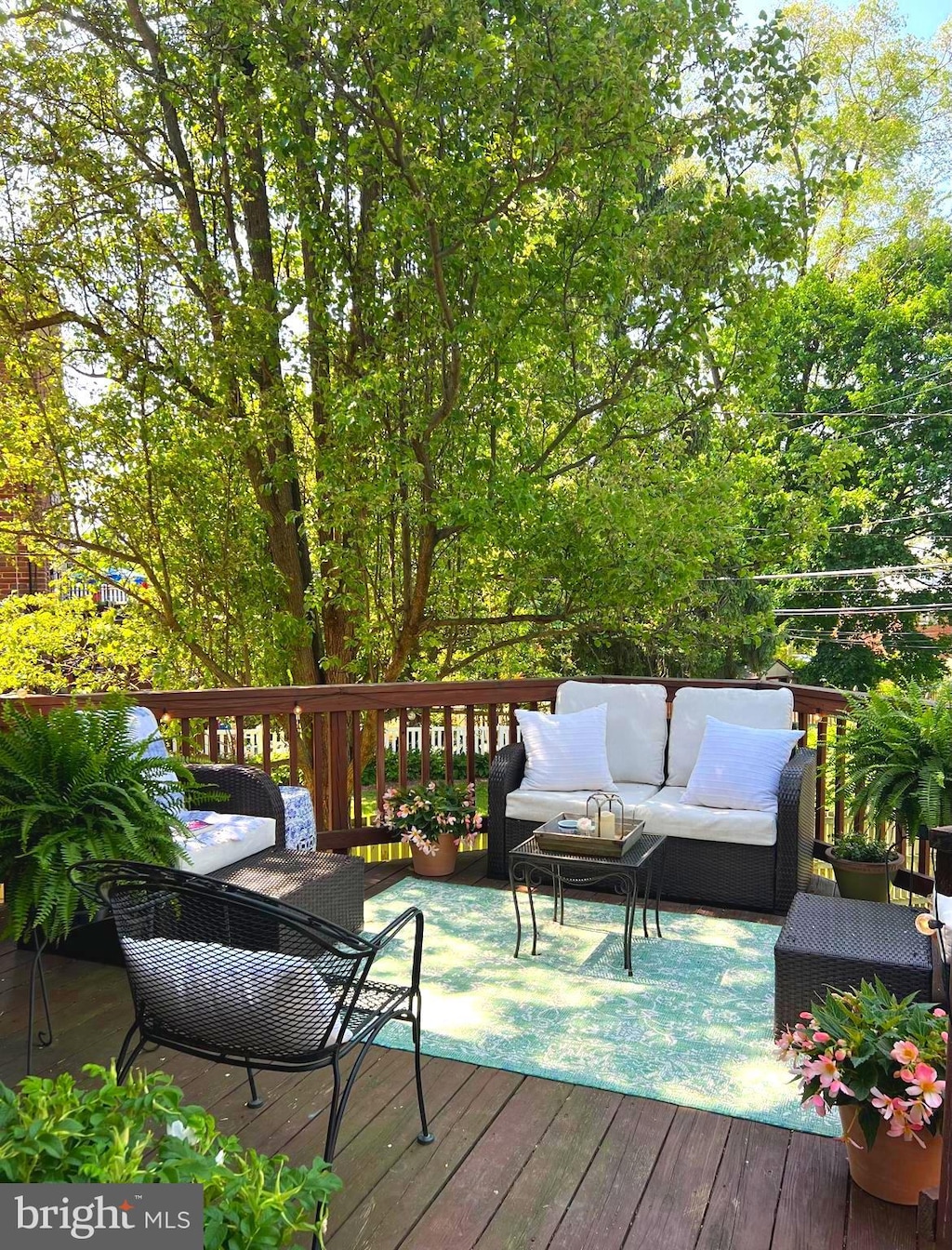 wooden deck with an outdoor hangout area