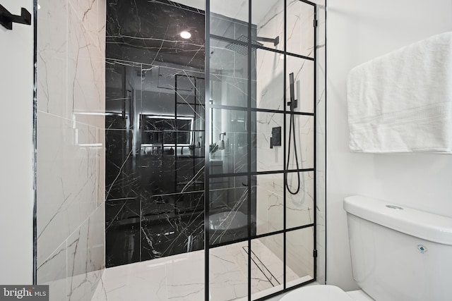 1372 Bryant St NE Unit 201, Washington, DC 20018 - bathroom featuring a marble finish shower and toilet