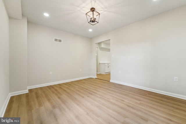 3216 E Joppa Rd, Baltimore, MD 21234 - unfurnished room featuring light wood-type flooring, recessed lighting, baseboards, and a chandelier