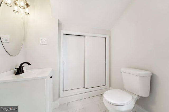 3216 E Joppa Rd, Baltimore, MD 21234 - bathroom featuring marble finish floors, toilet, vanity, and baseboards