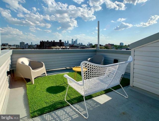 balcony featuring a city view