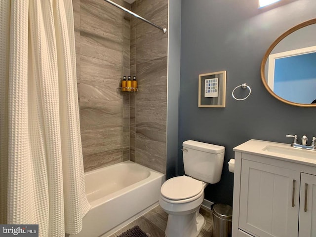bathroom with toilet, wood finished floors, shower / tub combo with curtain, and vanity