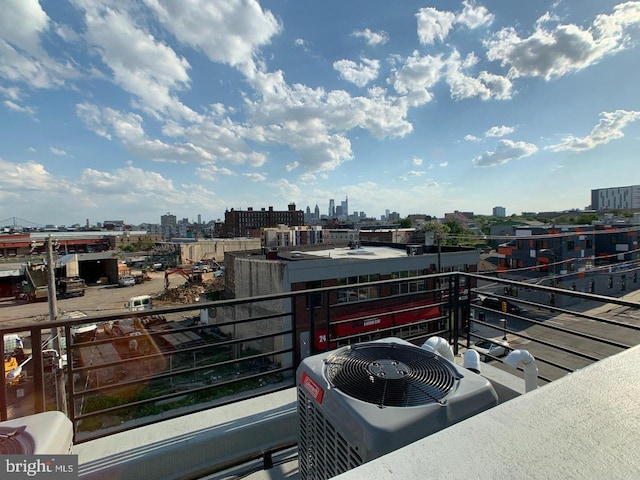 balcony featuring a view of city and central AC