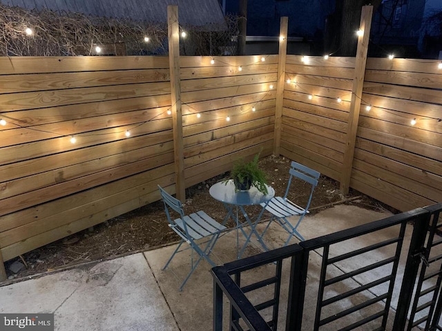 view of patio at night