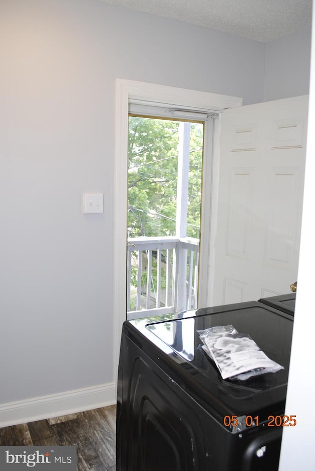 816 S Beaver St, York, PA 17403 - laundry area with baseboards, washer / clothes dryer, and dark wood-style floors