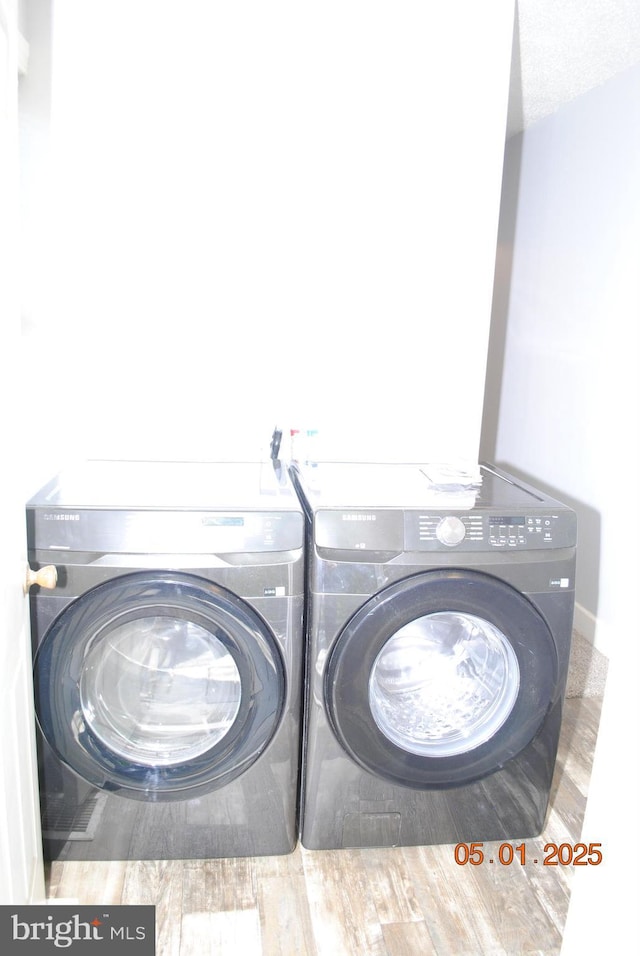 816 S Beaver St, York, PA 17403 - washroom with washer and dryer and wood finished floors