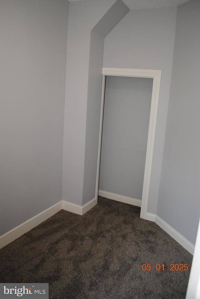 816 S Beaver St, York, PA 17403 - empty room with dark colored carpet and baseboards