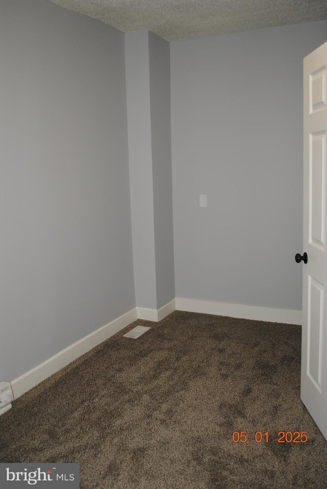 816 S Beaver St, York, PA 17403 - carpeted spare room featuring baseboards and a textured ceiling