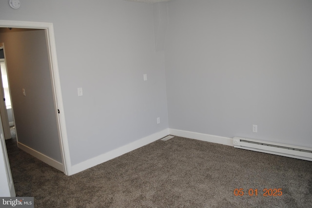 816 S Beaver St, York, PA 17403 - unfurnished room featuring dark colored carpet, baseboards, baseboard heating, and a smoke detector