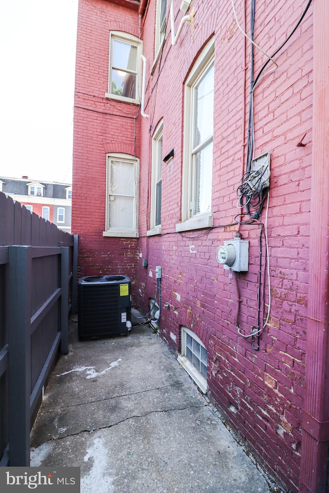 816 S Beaver St, York, PA 17403 - view of home's exterior with central air condition unit and brick siding