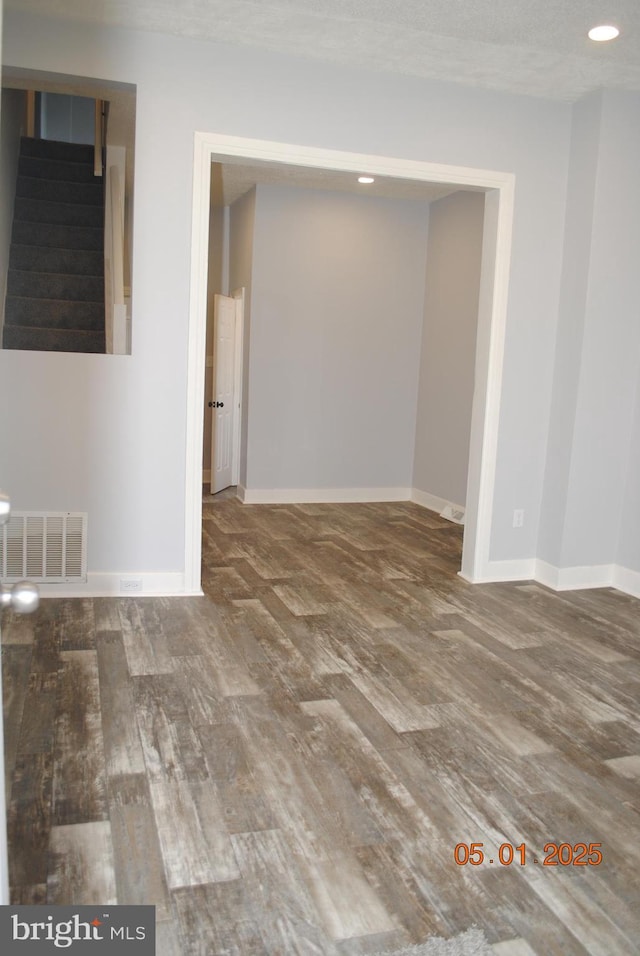 816 S Beaver St, York, PA 17403 - spare room featuring wood finished floors, baseboards, recessed lighting, and stairway