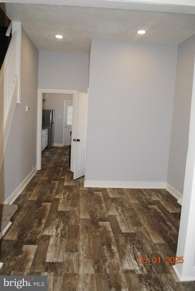 816 S Beaver St, York, PA 17403 - corridor featuring hardwood / wood-style flooring, baseboards, recessed lighting, a textured ceiling, and stairway