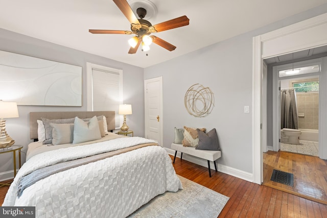 2610 Hamlin St NE, Washington, DC 20018 - bedroom featuring wood-type flooring, baseboards, ceiling fan, and attic access