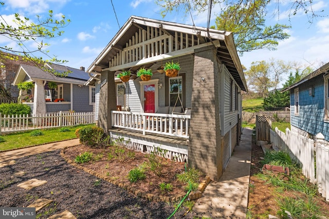 2610 Hamlin St NE, Washington, DC 20018 - view of front facade with a porch and fence