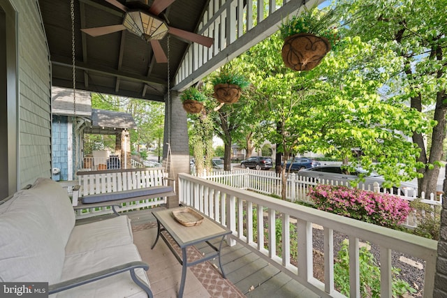 2610 Hamlin St NE, Washington, DC 20018 - wooden deck featuring ceiling fan, fence, and a porch