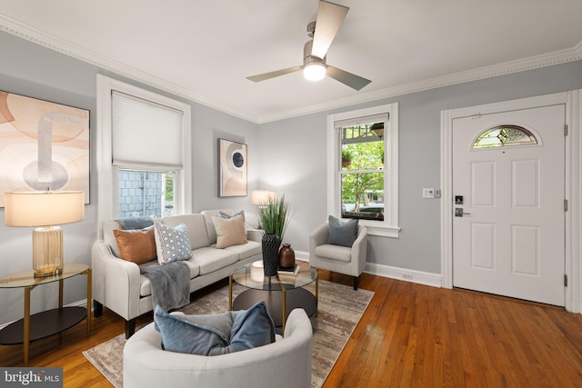 2610 Hamlin St NE, Washington, DC 20018 - living room featuring wood finished floors, ornamental molding, baseboards, and a ceiling fan