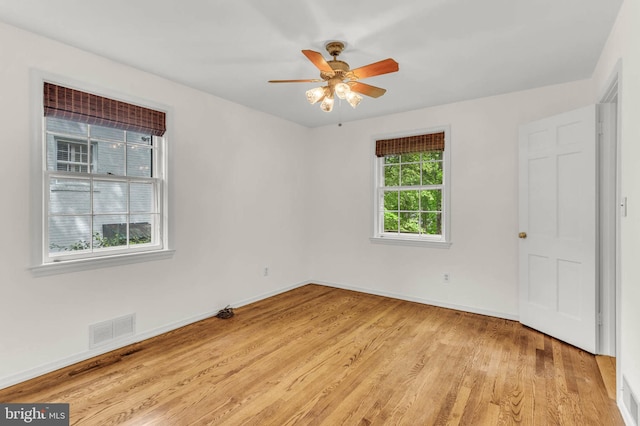 1529 Red Oak Dr, Silver Spring, MD 20910 - unfurnished room featuring light wood-style flooring, a ceiling fan, and baseboards