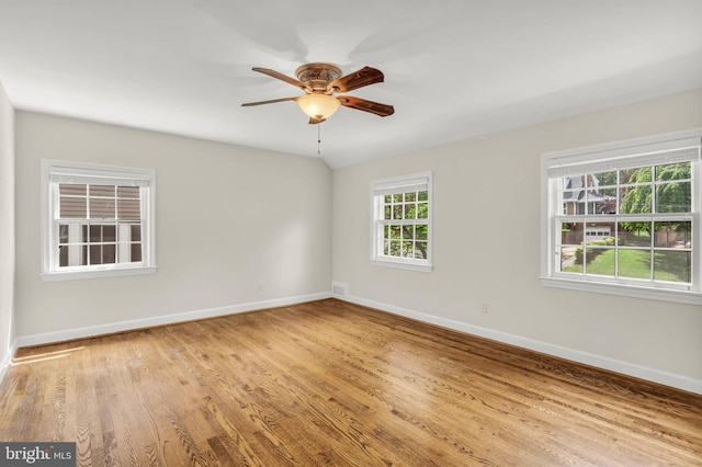1529 Red Oak Dr, Silver Spring, MD 20910 - spare room featuring baseboards, wood finished floors, and ceiling fan
