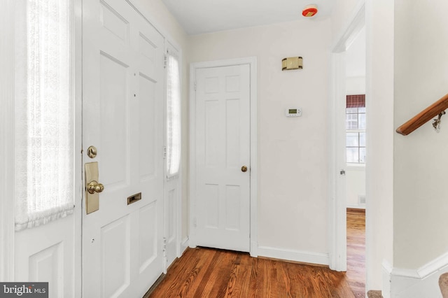 1529 Red Oak Dr, Silver Spring, MD 20910 - foyer entrance with dark wood-style floors and baseboards