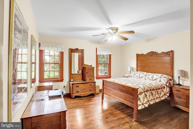 bedroom featuring ceiling fan and wood finished floors